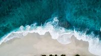 ocean waves on sandy beach